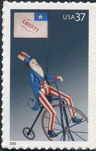 Uncle Sam on Bicycle with Liberty Flag