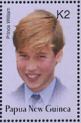 Wearing blue jacket and tie (facing forwards)