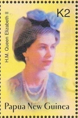 Wearing hat with blue flowers, c. 1958
