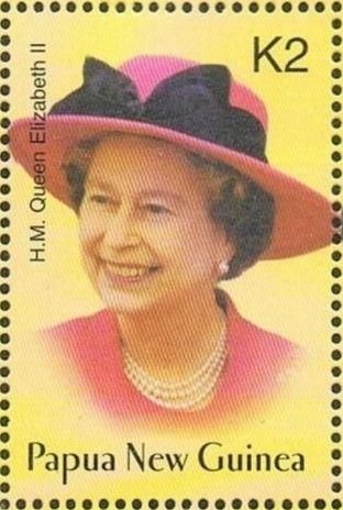 Wearing red hat with black bow, c. 1985