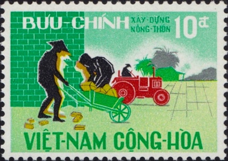 Workers with wheelbarrow and tractor