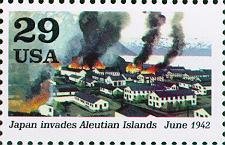 Dutch harbor buildings on fire (Japan invades Aleutian Islan