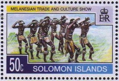 Group raising arms during traditional dance