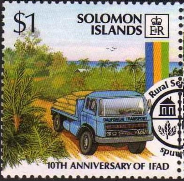 Flatbed track transporting food and emblem