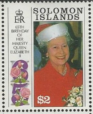 Queen wearing red and white hat