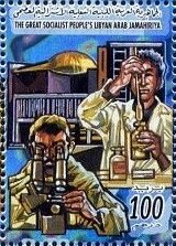 Chemist, man at microscope