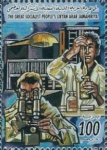 Chemist, man at microscope