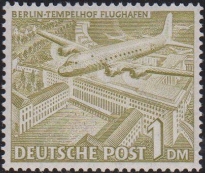 Airplane Douglas DC-4 over Tempelhof airport