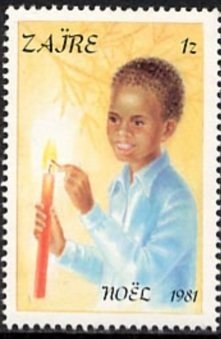 Child lightning a candle