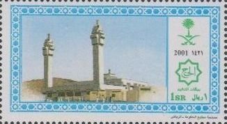 Mosque, tower at left and center.