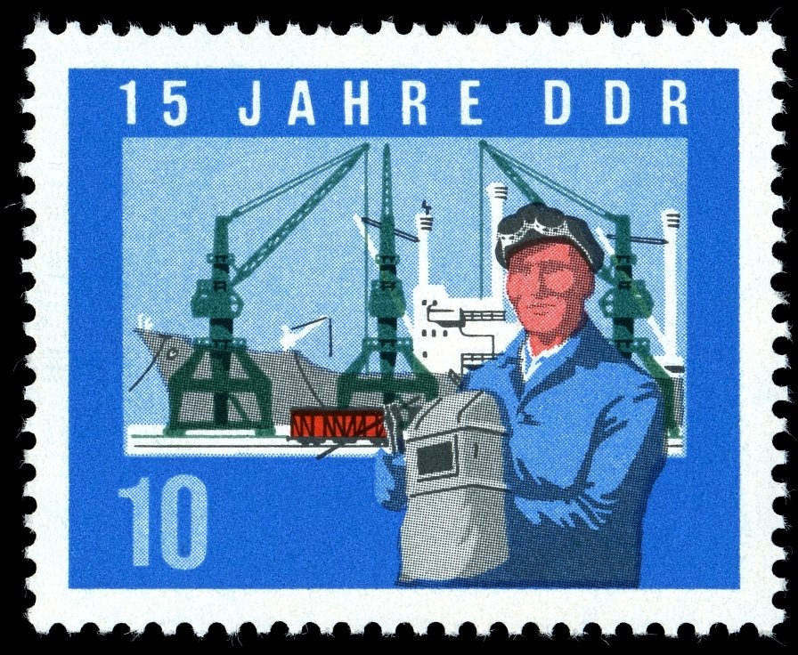 Welders, ship on the quay