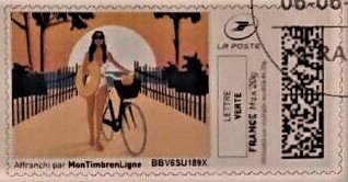 Girl Pushing a Bike at the Seaside